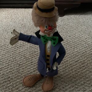 Blue and Green Clown Figurine.